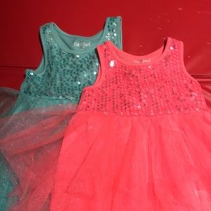 Two baby/toddler dresses.